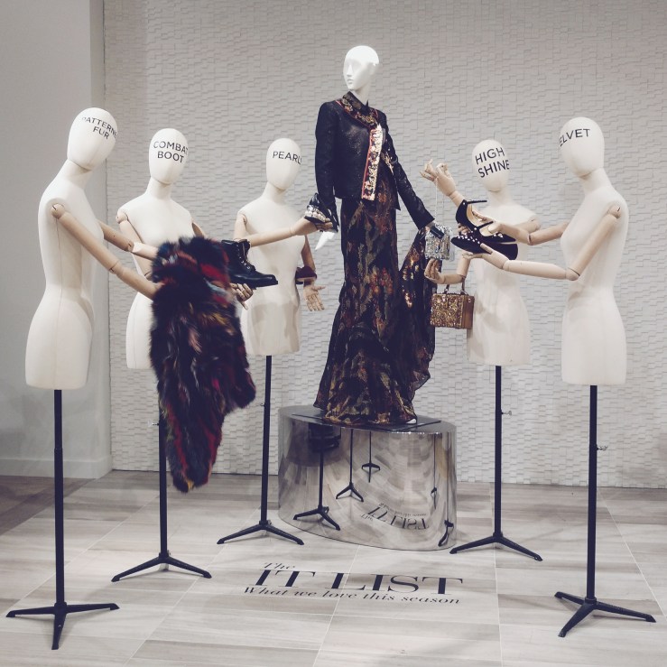 the silver birdcage purse held by 'HIGH SHINE' mannequin was to DIE for